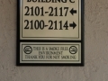 directions-to-buildings-plaque-on-concrete