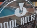 close-symbol-and-letter-on-pool-sign